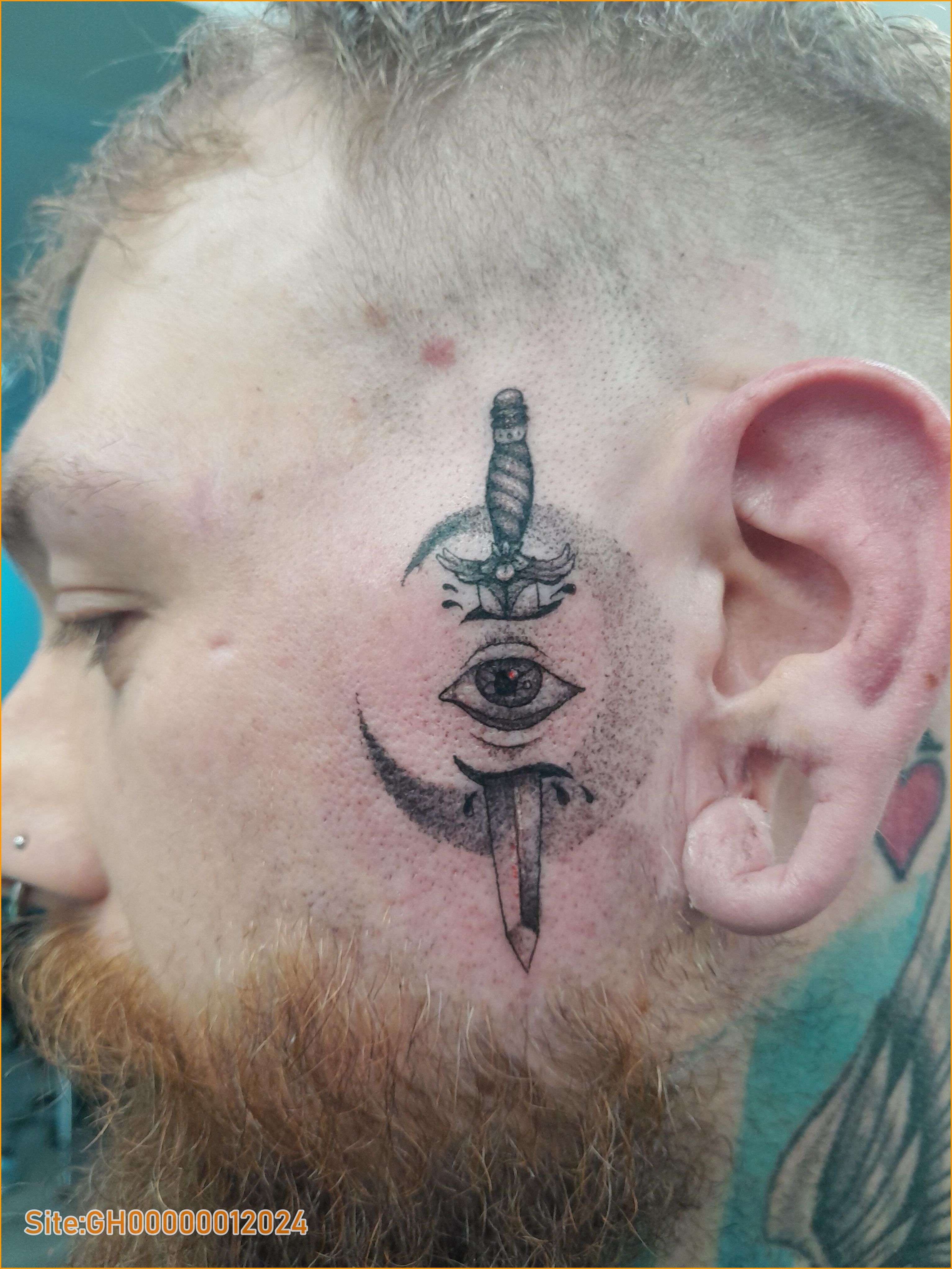 dagger face tattoo-4