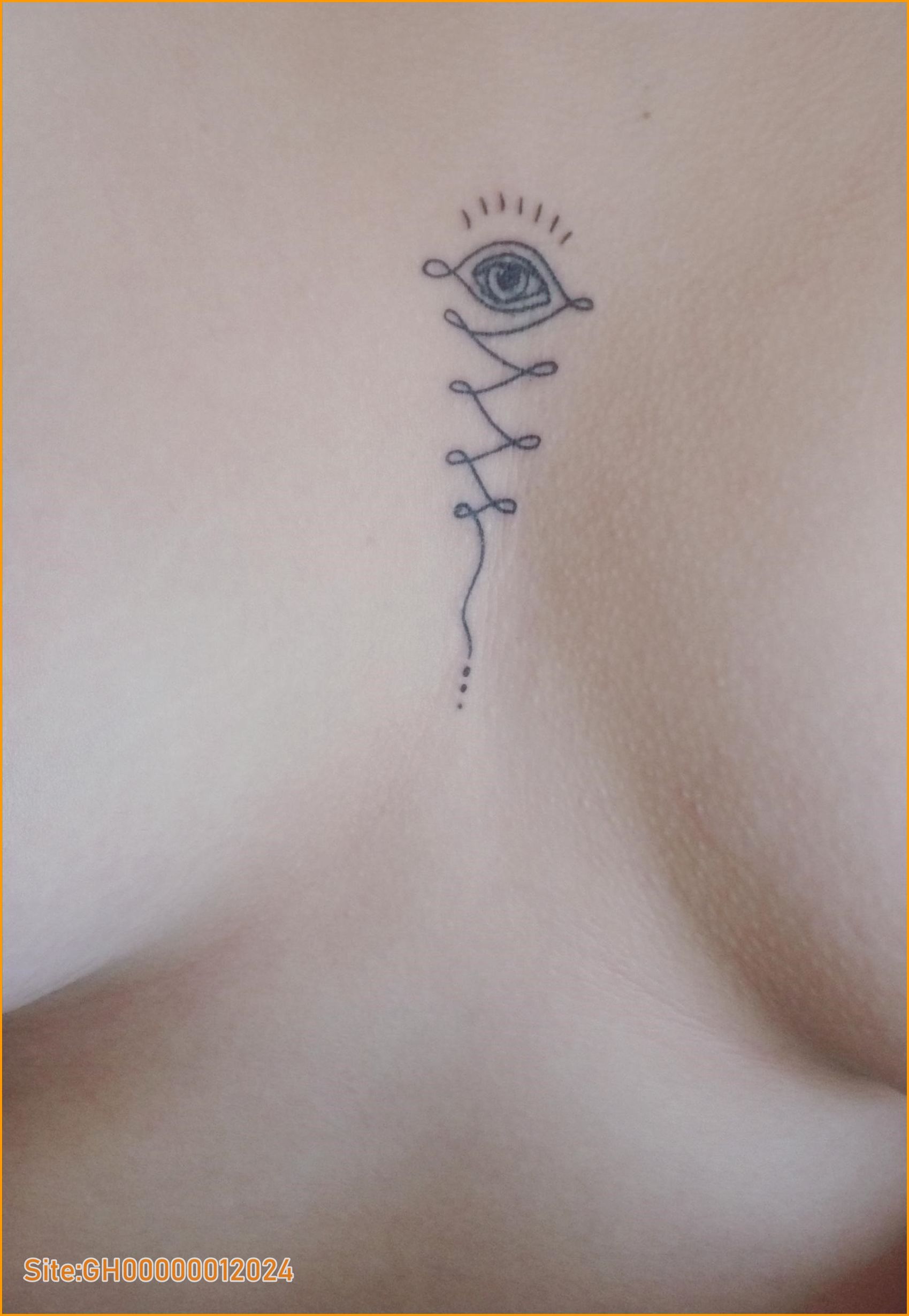 evil eye chest tattoo-1