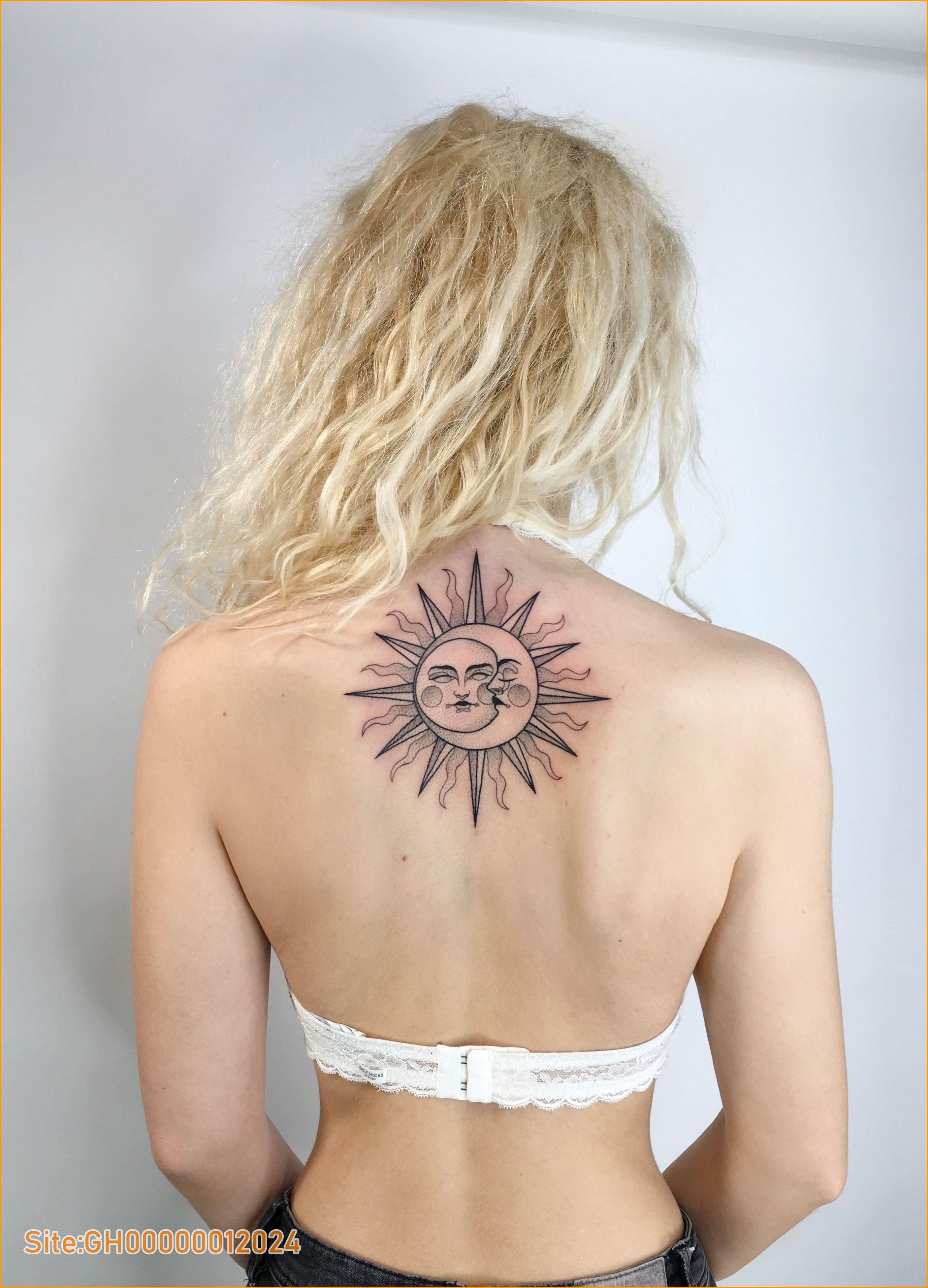 sun tattoo on back-2