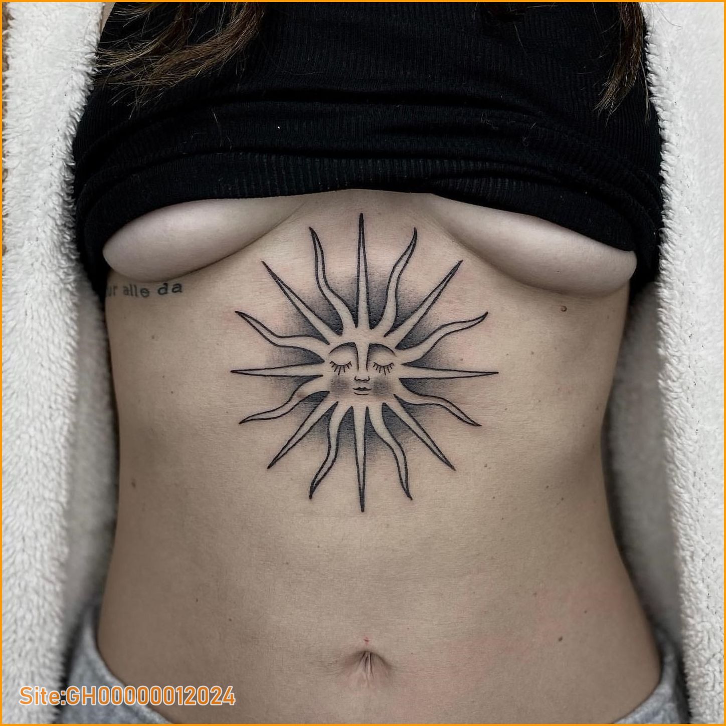 sun tattoo on chest-4